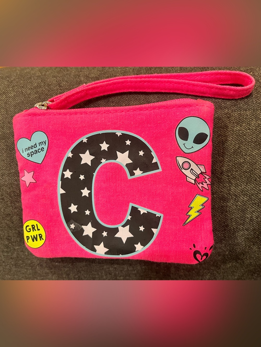Pink Kids Wristlet Pouch with Letter C and Space Graphics from Justice